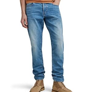 Herren Jeans von G-STAR RAW, Modell 3301, Regular Tapered Cut, blauer Stoff, bequeme Passform, normaler Bund, normale Leibhöhe, schmale Zuläufe von Knie zu Knöchel
