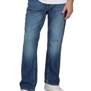 Mann in weißen Hemd und blauen Jeans mit MUSTANG-Label. Die Jeans sind aus Stretch-Fraktion, haben einen Bootcut-Stil und bestehen aus Baumwoll-Denim-Material. Die Farbe der Jeans ist Medium Blue (702). Die Größe der Jeans ist W 34 L 30.